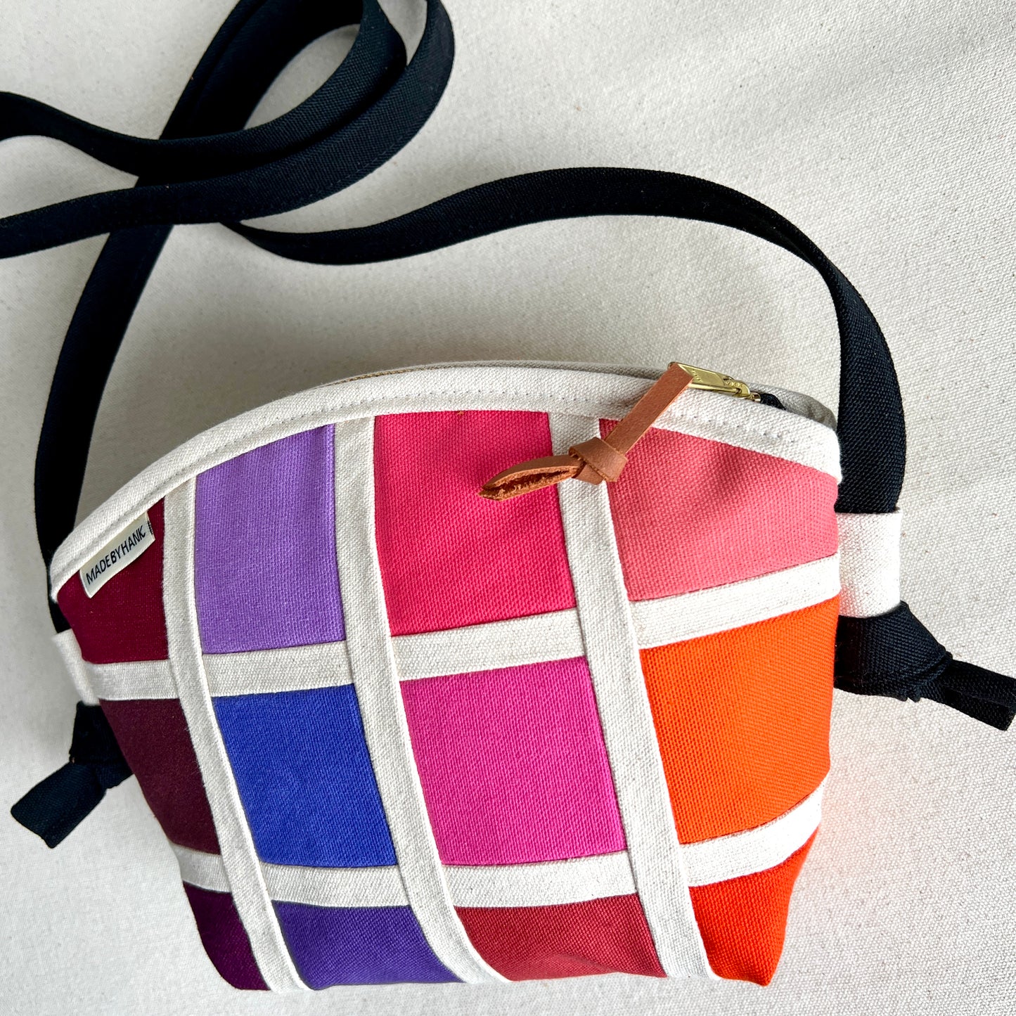 double-sided grid crossbody, natural with rainbow